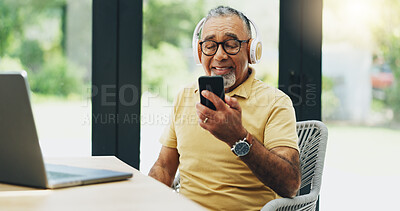 Buy stock photo Senior man, headphones and streaming music on phone, playlist and subscription at home for audio. Elderly person, laptop and reading news on mobile app, podcast and hip hop song for weekend fun