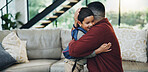 Smile, hug and kid with dad in home together for fathers day celebration with excitement. Happy, love and boy child embracing with man for care, bonding and family time in living room at house.