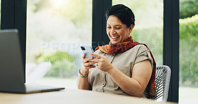 Buy stock photo Mature woman, phone and laughing in home office for social media gif, funny online meme and break from copywriting. Entrepreneur, person and smartphone with comic search, remote work and subscription