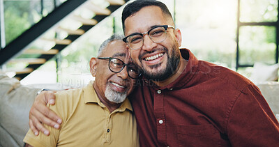 Buy stock photo Smile, hug and man with senior father on sofa relaxing together for fathers day celebration. Happy, love and portrait of elderly male person embracing son for care and bonding in living room at home.