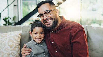 Buy stock photo Smile, hug and portrait of child with dad on sofa relaxing together for fathers day celebration. Happy, love and boy kid embracing with man for care, bonding and family time in living room at home.