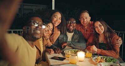 Buy stock photo Friends, outdoor selfie and dinner in night, patio or happy for memory, peace sign and new years eve celebration. Women, men and group with diversity, excited and funny face for post on social media