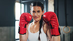 Portrait, gym and boxing glove with training, woman and practice for match and sports with endurance. Challenge, fighter or boxer with workout or girl in fitness centre or progress with health