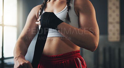 Buy stock photo Hands, gym and boxing with training, wrapping and practice for match and sports with endurance. Challenge, woman or boxer with workout or girl in wellness centre or progress with health and fitness