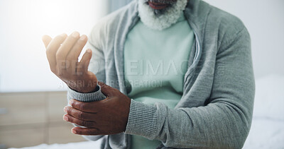 Buy stock photo Hands, senior man and injury with wrist pain, massage and arthritis with burnout in retirement home. Elderly person, accident and fibromyalgia with joint, bone and inflammation in morning at house