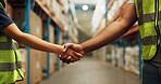 Handshake, logistics and closeup of people in warehouse with deal, partnership and ecommerce teamwork. Collaboration, greeting and zoom of employees shaking hands for onboarding welcome in factory.