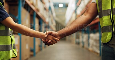 Buy stock photo Handshake, logistics and closeup of people in warehouse with deal, partnership and ecommerce teamwork. Collaboration, greeting and zoom of employees shaking hands for onboarding welcome in factory.