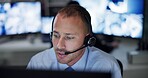 Man, safety and headset in control room for communication, surveillance and supervision or building security. Male guard, contact or cctv monitors with telecom advice for check, support or protection