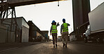 Construction worker, team and walking with inspection at logistics site in morning for vehicle safety, cargo export or ideas. Shipping industry, collaboration or outdoor with back for quality control