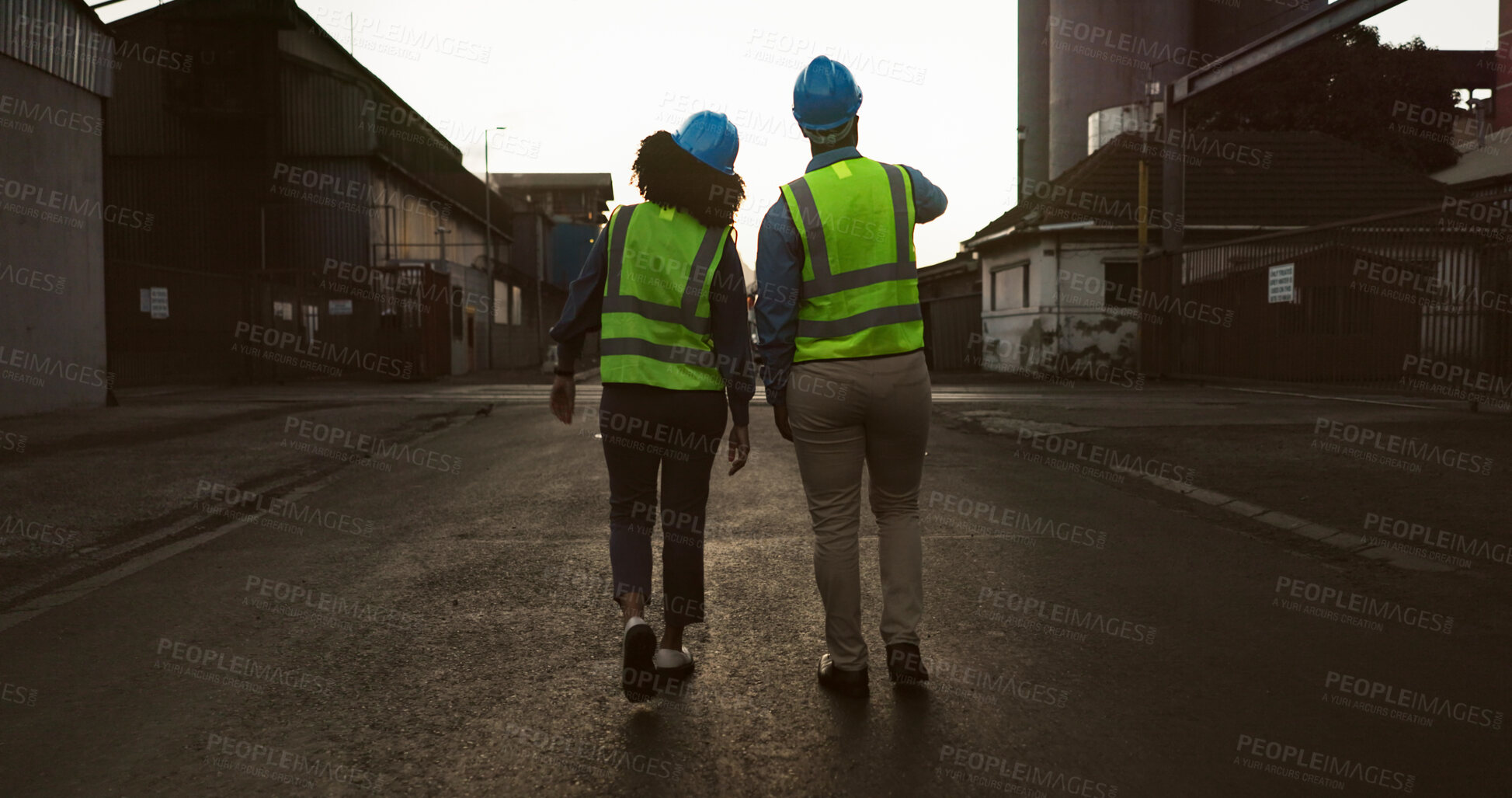 Buy stock photo Construction worker, team and walking with back at logistics site in morning for engineer inspection or cargo export. Shipping industry, planning and outdoor with discussion for quality assurance