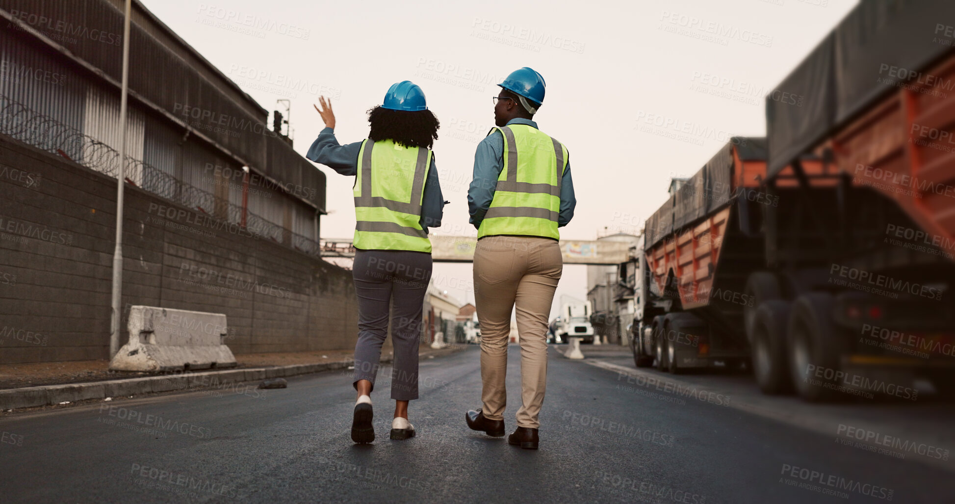 Buy stock photo Construction worker, team or talking with planning at site in morning for inspection, architecture or maintenance. Engineering, collaboration and outdoor with meeting for project management with back