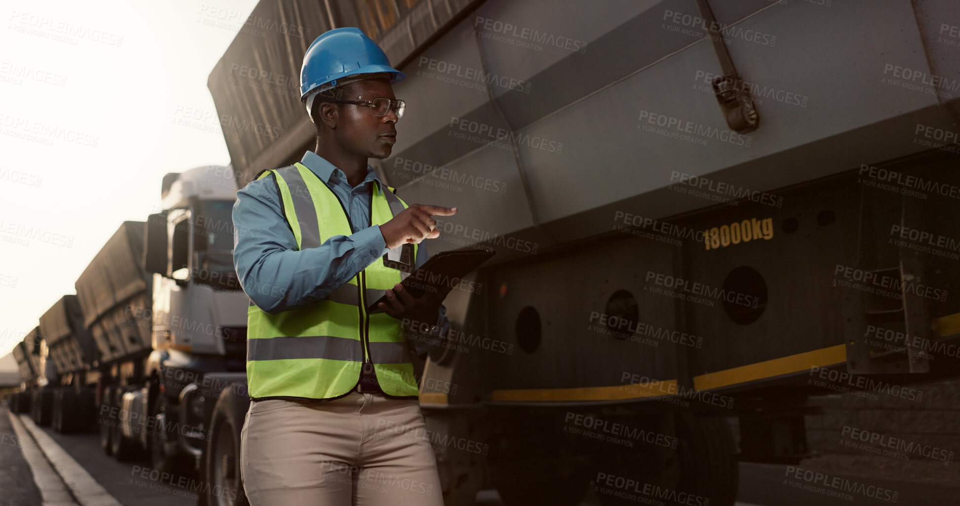 Buy stock photo Construction worker, man and tablet by truck for shipping with vehicle inspection for logistics and cargo export. Transport industry, site manager or black employee with app for maintenance and check