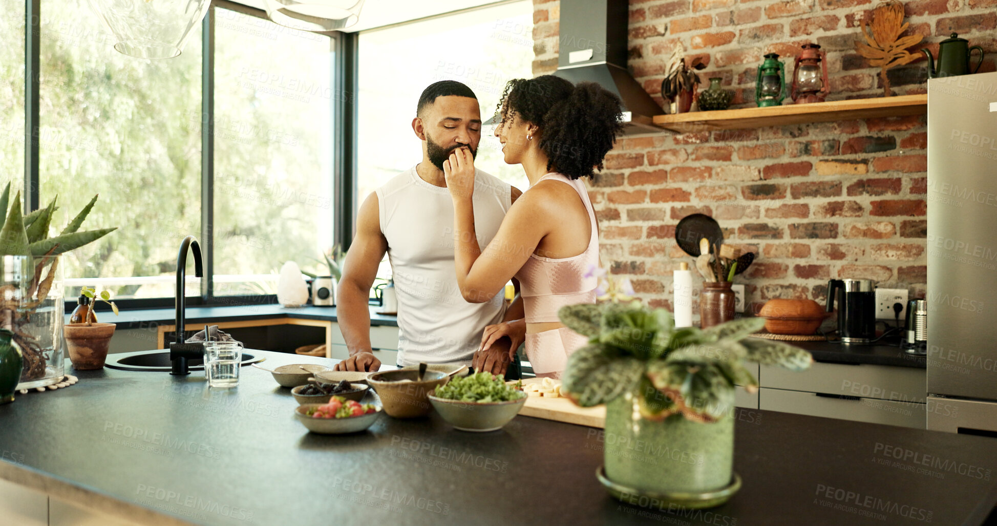 Buy stock photo Happy couple, wellness and tasting in apartment for nutrition, together with fruit for healthy diet. Man, woman and breakfast with snack in house for morning date, excited for cooking in kitchen