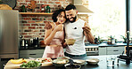 Happy couple, wellness and cooking in kitchen for nutrition, together with hug for healthy diet. Man, woman and preparing breakfast with fruit in house for morning date, food for hunger in apartment