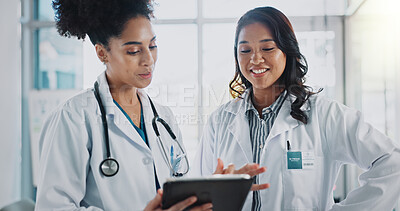 Buy stock photo Women, doctors and happy with tablet in hospital for patient information, appointment and schedule. Database, medical and healthcare practitioner with technology for telehealth, service and medicine