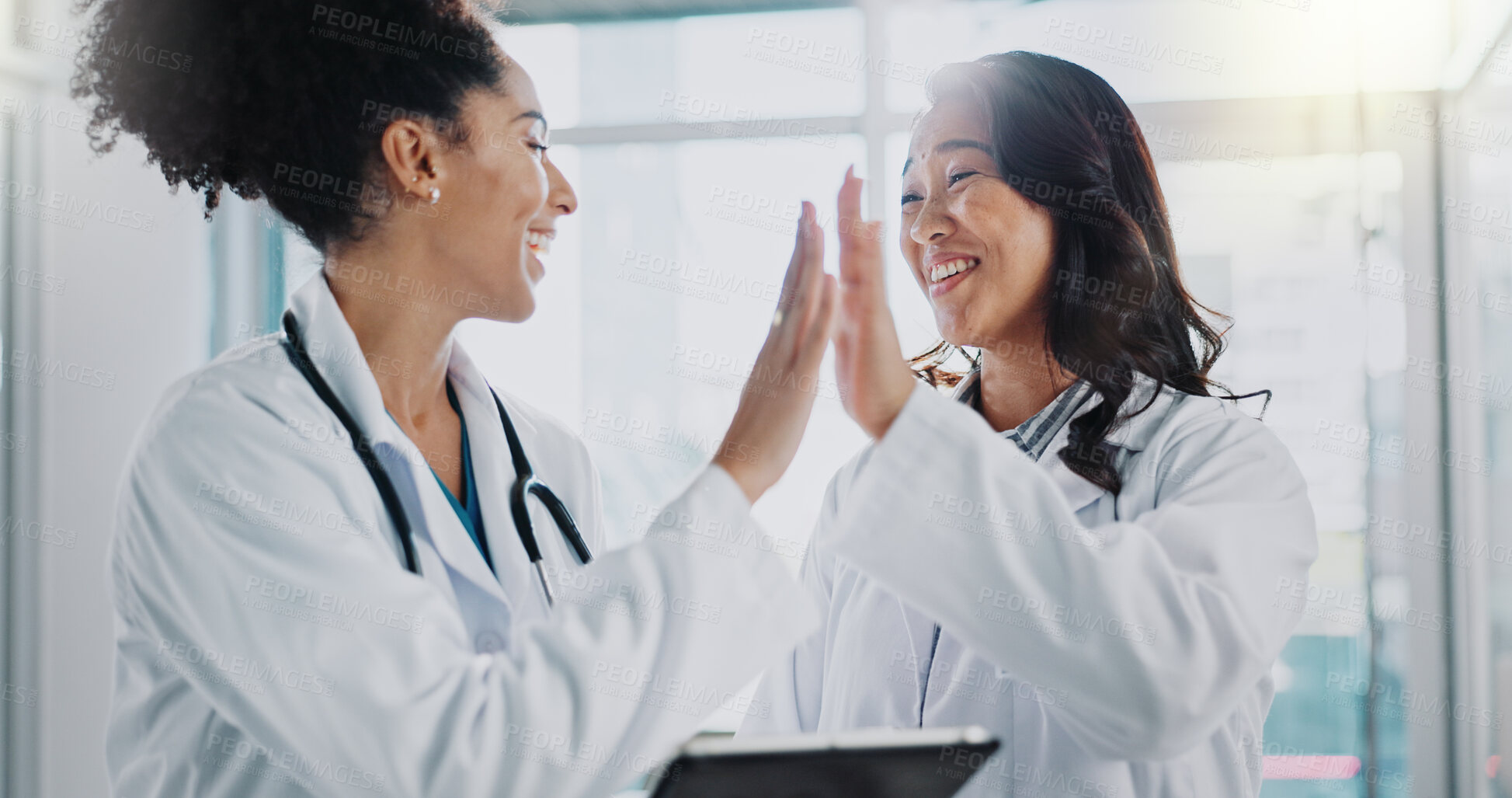 Buy stock photo Tablet, people or doctors high five for success, goals or achievement target in hospital for healthcare. Proud, happy women and excited workers with nursing progress, medical mission and teamwork