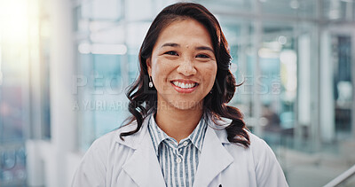 Buy stock photo Asian doctor, woman and smile in portrait at clinic for research, healthcare and for medical innovation. Person, happy and excited for career in hospital for wellness, service and Indonesia