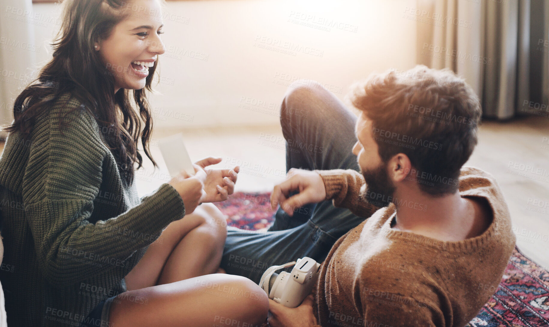 Buy stock photo Happy couple, photography and relax with memory for love, care or fun bonding moment together on floor at home. Excited or young man and woman with smile for camera, picture or relationship at house