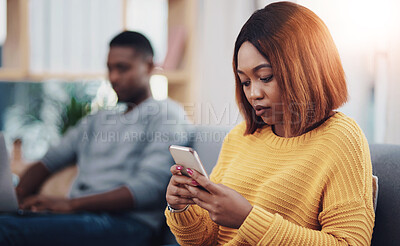 Buy stock photo Couple, woman or phone addiction in home on sofa in living room with online affair, girl or boyfriend. Attention, relax and female person texting on social media or mobile app in house for cheating