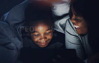 Buy stock photo Tablet, child and mother with storytelling, tech and digital video in family home at night. Love, care and bonding with online education app, movie or cartoon in house with smile and ebook for youth