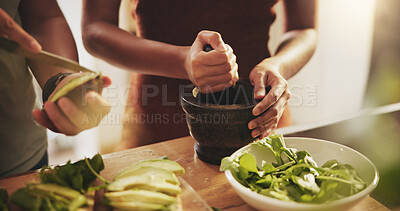 Buy stock photo Hands, couple and healthy food in kitchen with avocado, vegetables and leaves for breakfast or lunch. People with support, helping and cooking together at home for nutrition and care with green meal