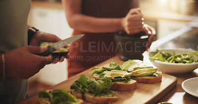 Buy stock photo Hands, couple and healthy food for breakfast sandwich, lunch or meal in kitchen with avocado bread. People in support, help and cooking together with green vegetables at home for nutrition and care