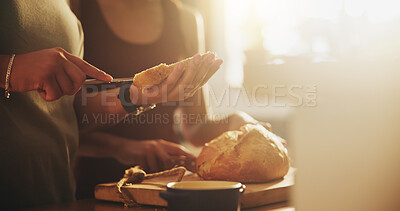 Buy stock photo Kitchen, morning and hands of people with bread on counter with slice for sandwich, breakfast and meal. Food, baking and baked goods, roll or loaf for wellness, eating and carbohydrates in home