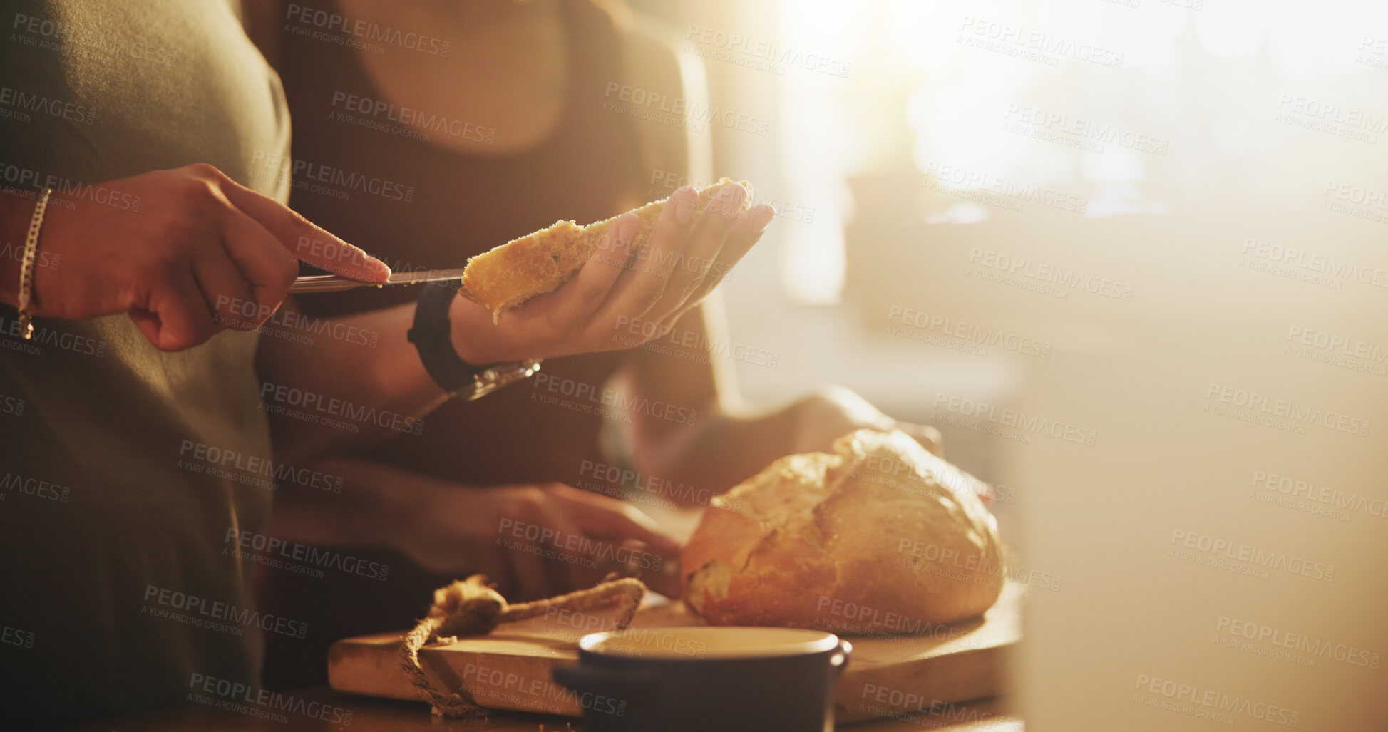 Buy stock photo Kitchen, morning and hands of people with bread on counter with slice for sandwich, breakfast and meal. Food, baking and baked goods, roll or loaf for wellness, eating and carbohydrates in home