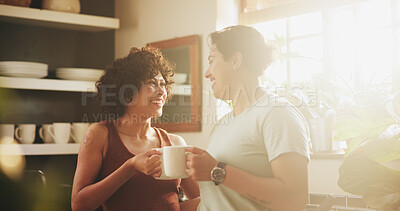 Buy stock photo Women, couple and lesbian in kitchen with coffee on morning for breakfast, relax and enjoy. Support, care and happy or conversation with cup of tea to chill, fun and bonding in home on caffeine drink