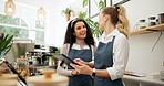 Woman, cafe and employees talking with tablet, happy and laughing in conversation or learning with new staff. Digital, small business or touch screen systems, online search or program with teamwork