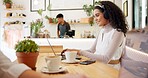 Laptop, cafe and woman with remote work, video call and headphones for social media webinar. Typing, music and website update of a web designer working at a restaurant and coffee shop with drink