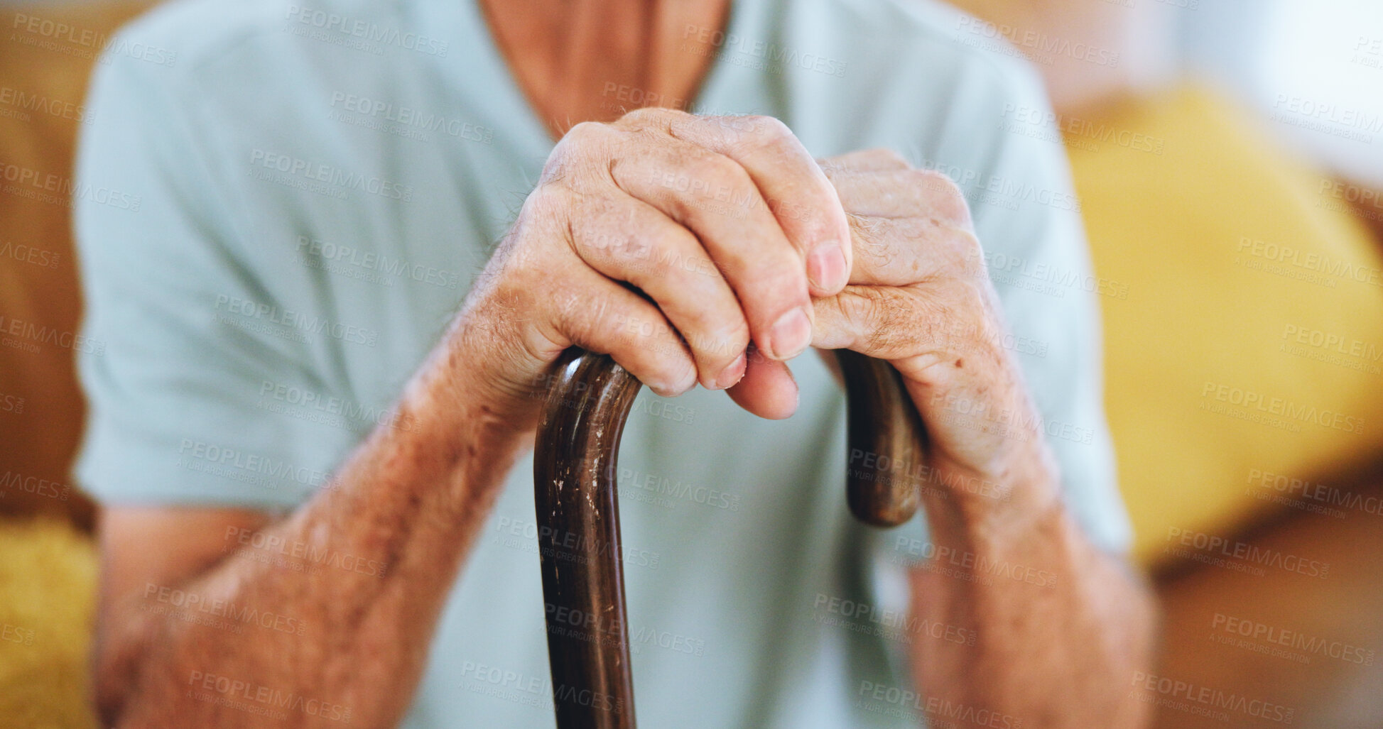 Buy stock photo Senior man, hands and cane for balance in recovery, home and support in rehabilitation or arthritis. Walking stick, mobility and person with disability from injury, assistance and osteoporosis care