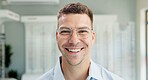 Smile, optometry and portrait of man with glasses for vision, eye health and wellness in store. Happy, ophthalmology and face of male person with prescription lens spectacles in optical clinic.