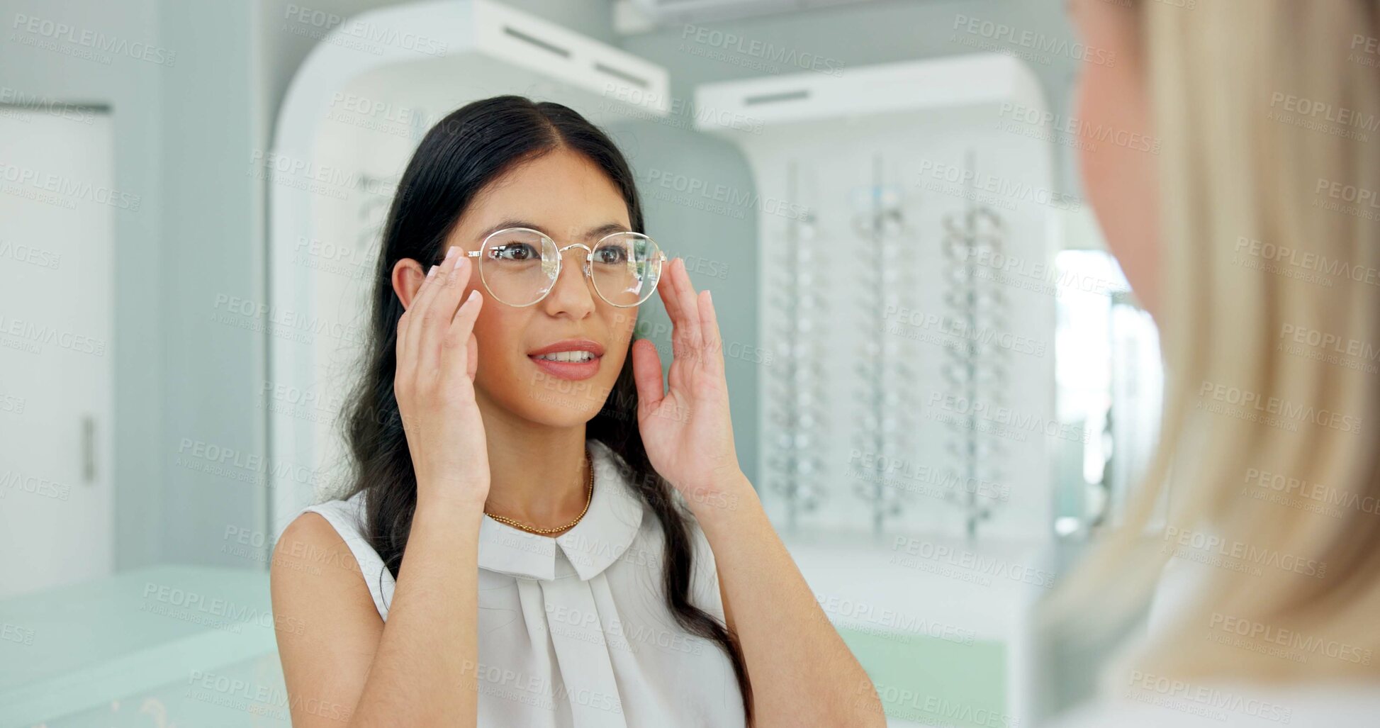 Buy stock photo Woman, optometrist and consultation with glasses in store with choice, help and eye care for vision. People, optician and customer with smile for health, wellness or decision for trendy style in shop