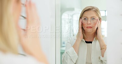 Buy stock photo Woman, glasses and mirror at store for vision, eye care and wellness for eyesight, frame and choice. Person, customer and check reflection with decision for optometry, health and style at retail shop