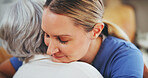 Senior woman, nurse and hug with love for elderly care, support or assistance at nursing home. Female person or caregiver with mature patient for embrace, healthcare or bonding at old age house