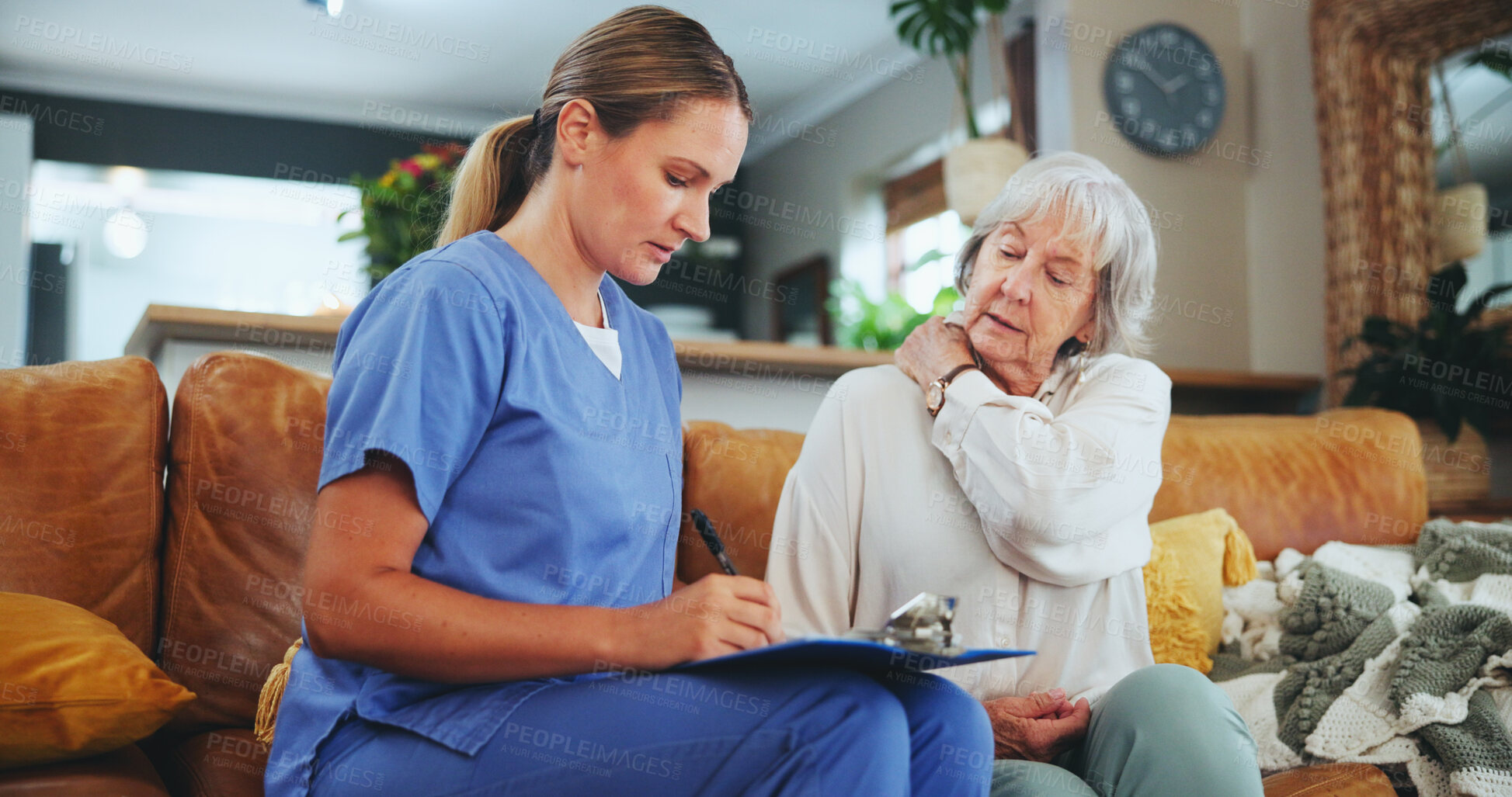 Buy stock photo Senior woman, nurse and writing with consultation for elderly care, pain or injury at old age home. Female person or caregiver taking notes with mature patient for healthcare or retirement at house