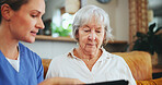 Senior woman, nurse and healthcare with tablet for monitoring health, consultation or results at nursing home. Female person or caregiver talking to mature patient with technology for elderly care