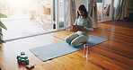 Girl, living room and online with tablet for yoga or virtual class, personal blog and content creation for internet. Woman, pose and calm in home for peace or mindset, exercise and mental health.