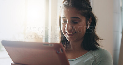 Buy stock photo Girl, earphones and happy with tablet in home for music streaming, audio subscription or social media video. Woman, person or smile with digital app for listening to radio, playlist or internet album