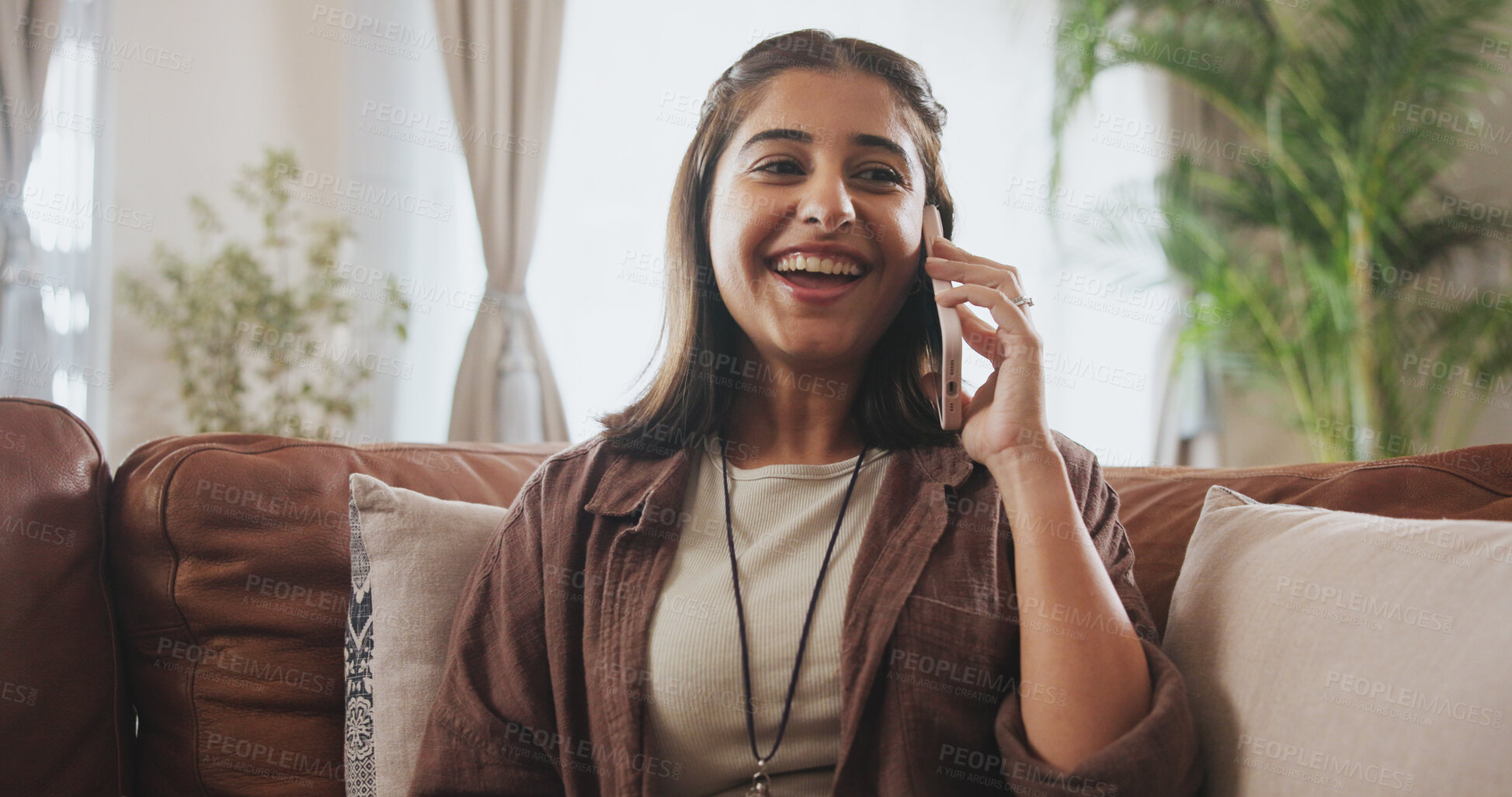 Buy stock photo Happy, woman and phone call on sofa for conversation, communication or internet connection in home. Female person, smile or excited with mobile tech on couch for chat talking and social media