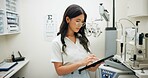 Woman, tablet and clinic for optometry, eye care or contact for test, telehealth or stock check on app. Person, optician and digital touchscreen for report, review or online order for vision in store