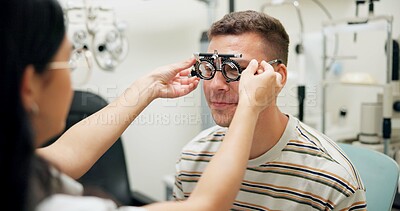 Buy stock photo Optometrist, patient and assessment in clinic for eye exam, optometry and vision with phoropter. Specialist, man and testing machine in hospital for healthcare, wellness or ophthalmology for glaucoma