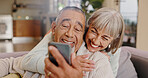 Elderly couple, selfie and smile in lounge, hug and together in house, online and photography for memory. Home, profile picture and old man with woman, happiness and app in mobile and love in post