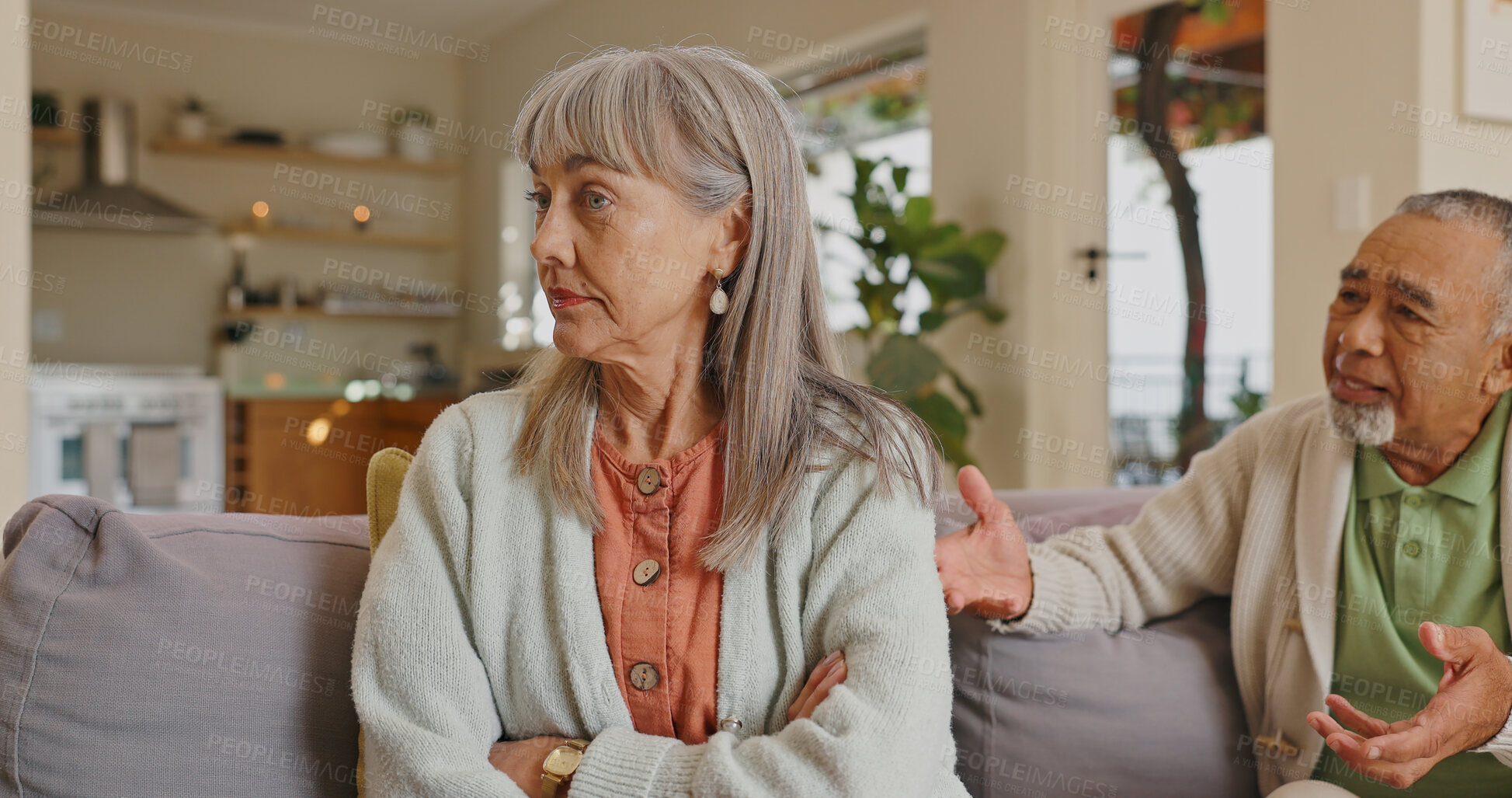 Buy stock photo Home, ignore and senior couple on sofa after argument, fighting or misunderstanding with conflict. Married people, woman and man with talking, angry wife or frustrated with silent treatment in lounge