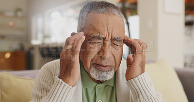 Buy stock photo Home, senior man and headache on sofa for stress, emotional conflict and temporal vertigo. Living room, couch and old person with pain, migraine and anxiety due overthinking in retirement in house