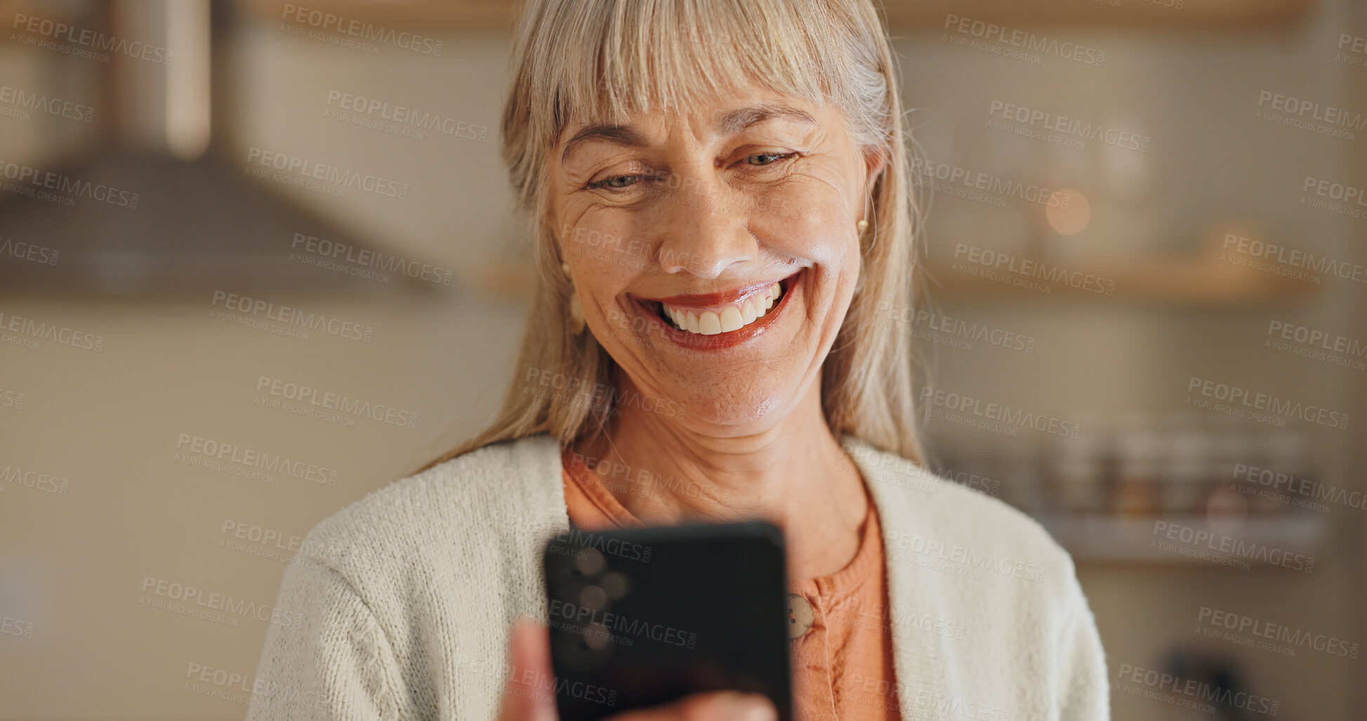 Buy stock photo Home, smile and elderly woman with phone for network, communication and reading online news. House, internet and senior person with smartphone for digital media, information and website connectivity