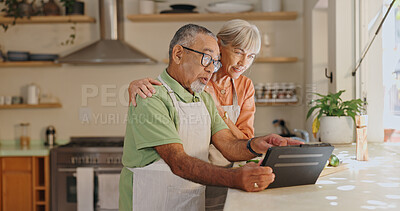 Buy stock photo Home, senior couple and tablet for recipe, ingredients or instructions for vegan food. Kitchen counter, woman or man in marriage with digital app, meal prep or healthy diet to prepare with scroll