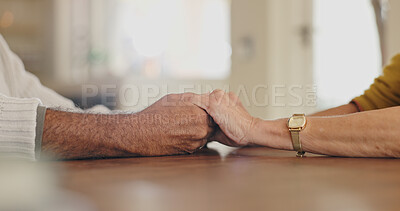 Buy stock photo Closeup, home and senior couple holding hands, trust and sympathy with compassion, empathy and kindness. Apartment, old man and mature woman with faith, prayer and relax with love, care and comfort