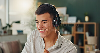 Buy stock photo Headphones, happy and man with music in home for online audio, entertainment and listening to radio. Smile, person and technology with internet in house for sound, streaming service and subscription